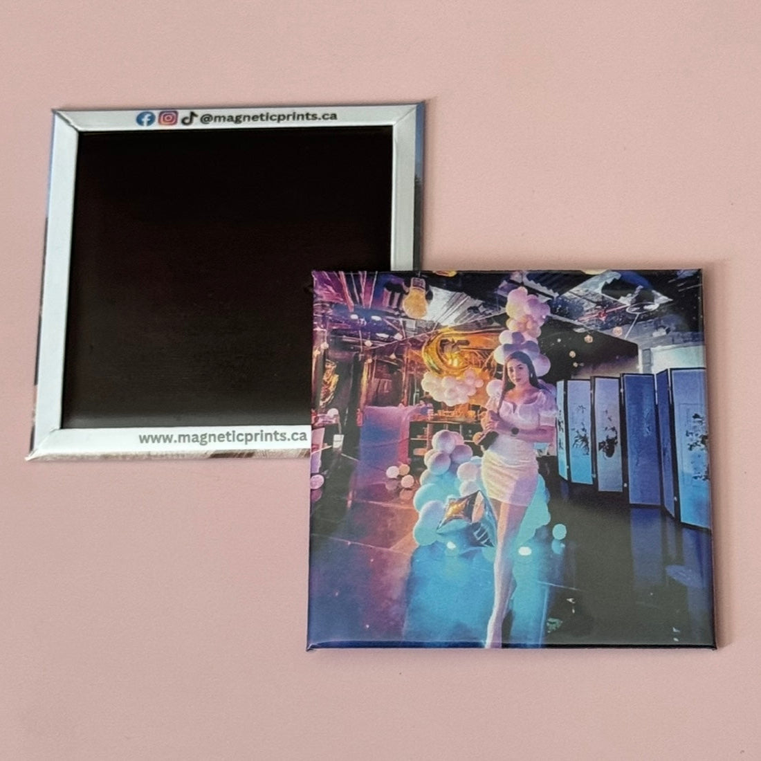 A square custom photo magnet with a vibrant indoor scene is shown next to its back, which features branding details.